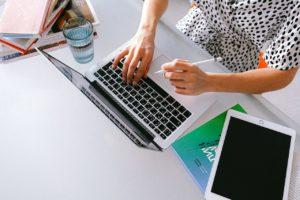 image shows woman using computer tools for accessibility