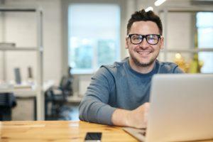 image shows man happy with clm document