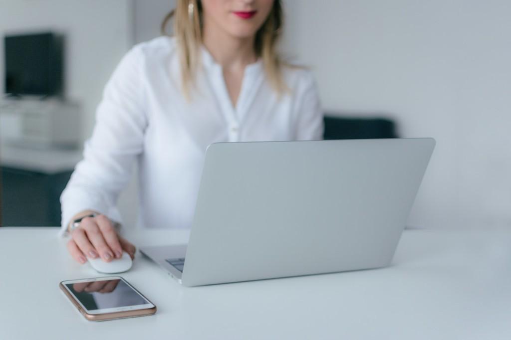 image shows woman monitoring contract and document automation