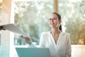 image shows woman in control of legal contracting