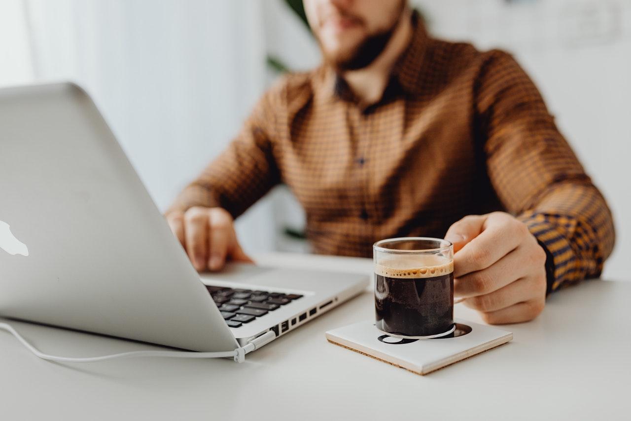 image shows man focusing on contract automation software for e-commerce