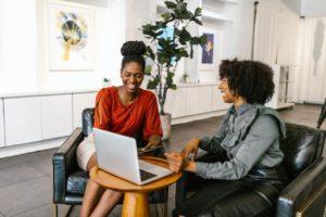 image shows women with successful contract management